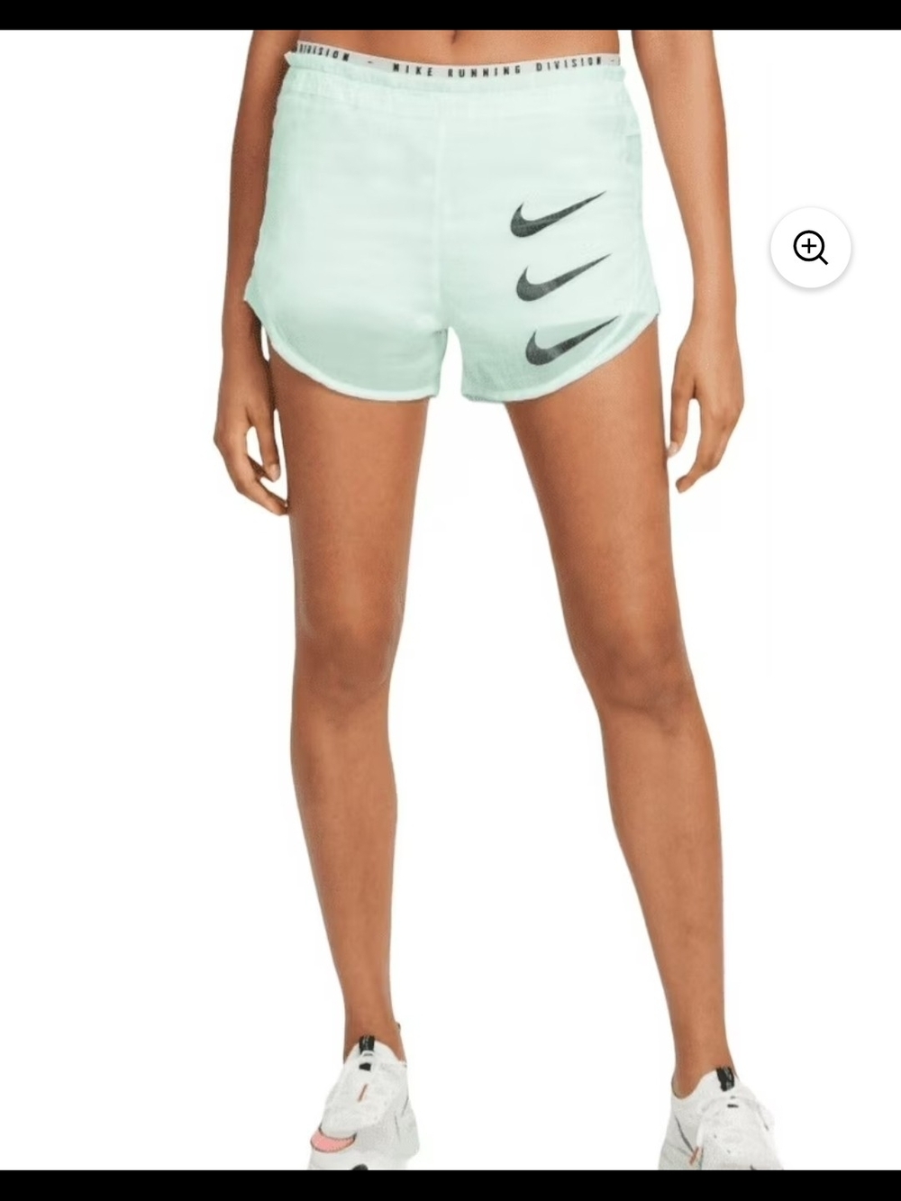 Nike Women's Mint Green Athletic Shorts with Triple Swoosh